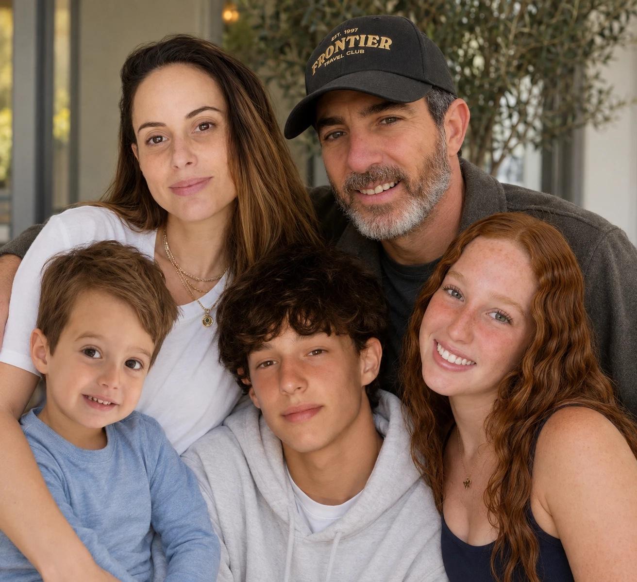 Scott Fineman, founder of Frontier Travel Club, with his family